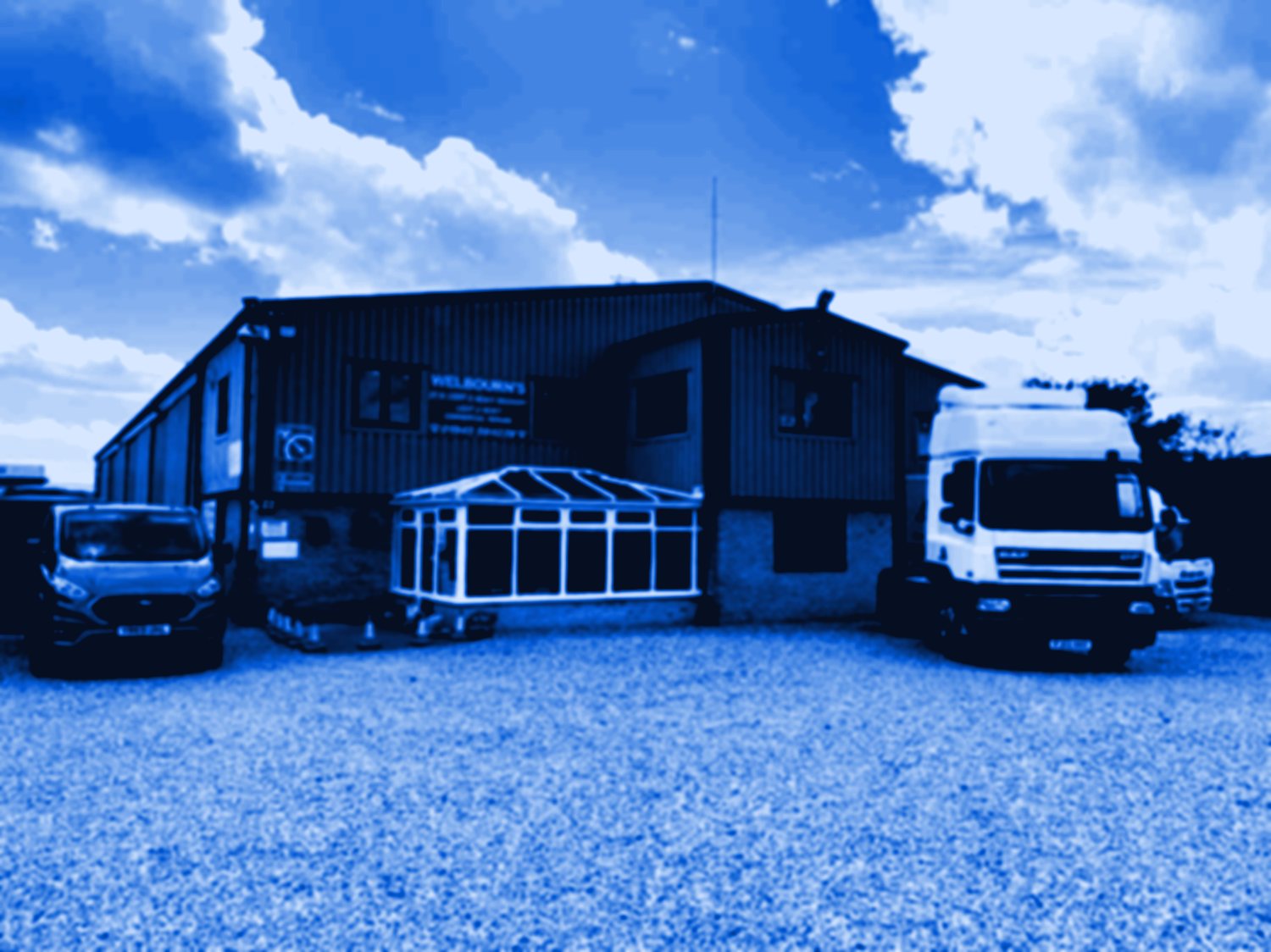 Welbourn's Wisbech depot with a DAF tractor unit and van on the yard